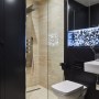 Notting Hill Story | Guest bathroom - lights on | Interior Designers